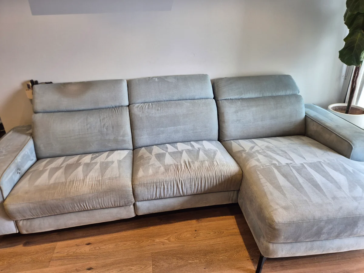 The same light-fabric sofa after upholstery cleaning